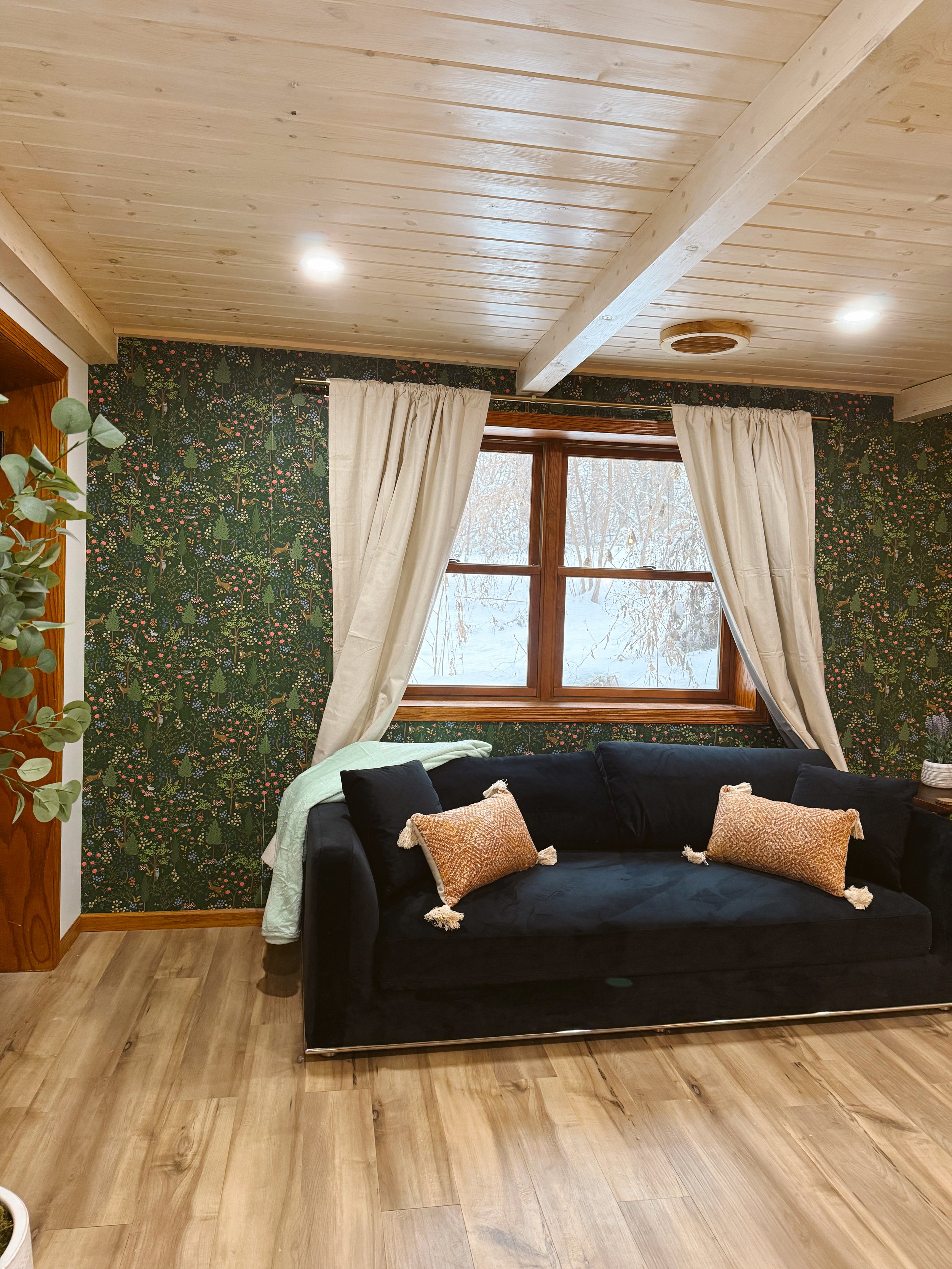 Living Room with Whimsical Fox Wallpaper and Window